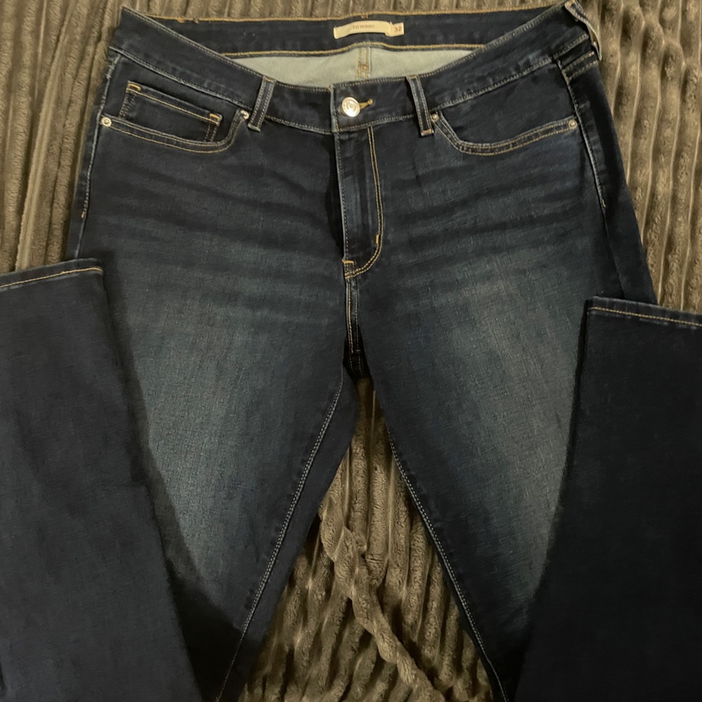 Levi Strauss blue jeans. Like new. Washed never worn. 14/32
